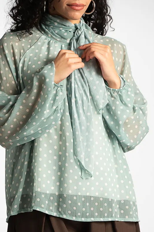 Polka dot blouse with neckline