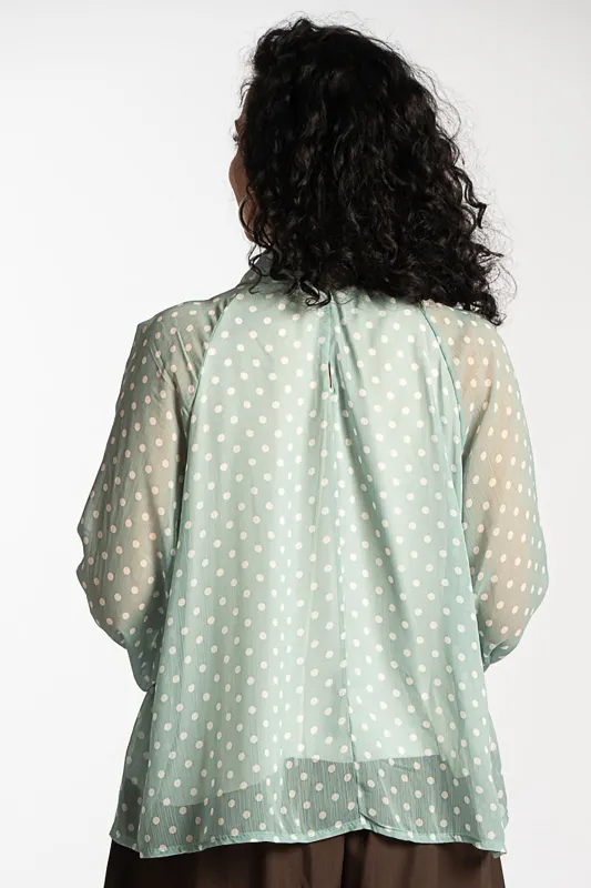 Polka dot blouse with neckline